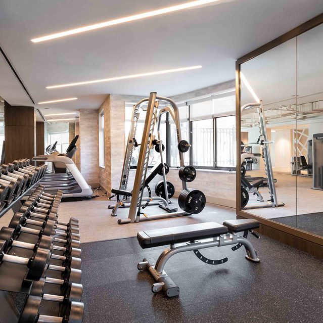 Instrata Pentagon City - Fitness Area with Free Weights and Mirrored Wall