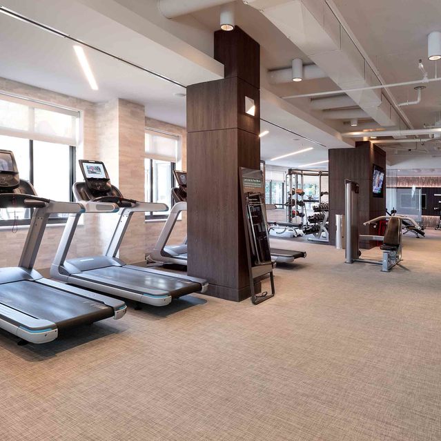 Instrata Pentagon City - Spacious Fitness Area with Treadmills and Windows