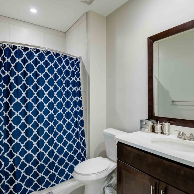 Instrata Pentagon City - Bathroom with Vanity and Bathtub